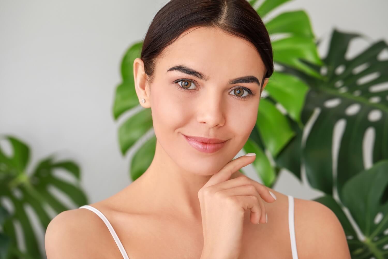 top benefits of chlorphyll for the skin showing a women with health skin